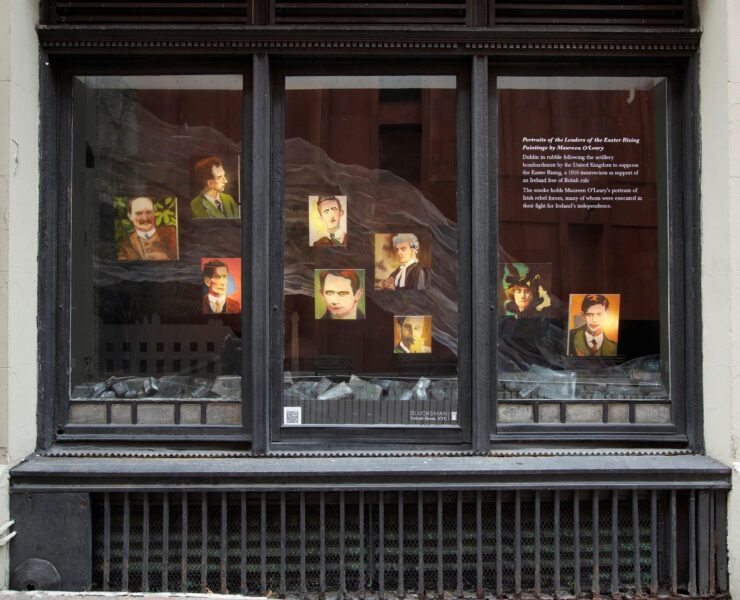 A picture containing building, outdoor, stone, store Description automatically generated