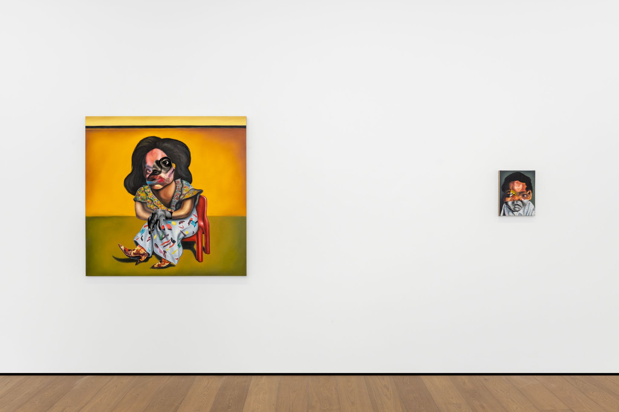 A couple of paintings on a wall

Description automatically generated with low confidence