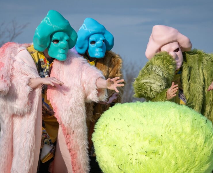 A group of people wearing clothing Description automatically generated