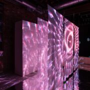 A group of pink lights on display AI-generated content may be incorrect.