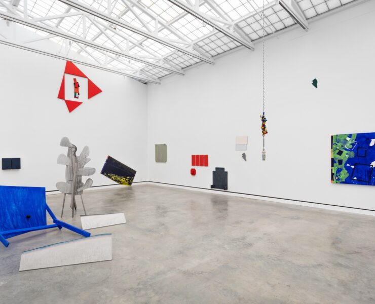 A room with art pieces on the wall AI-generated content may be incorrect.