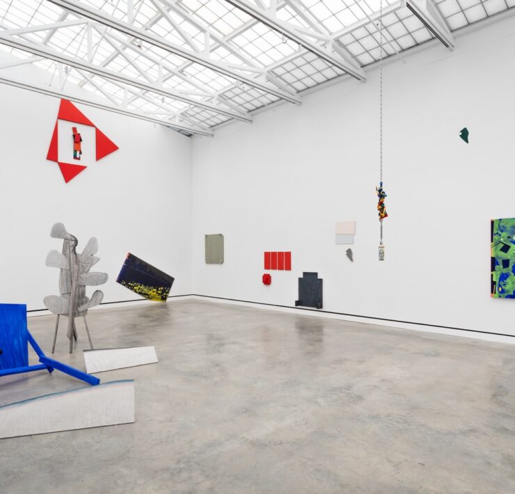 A room with art pieces on the wall AI-generated content may be incorrect.