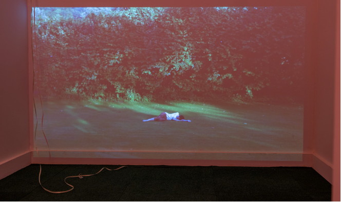 A person lying on the ground AI-generated content may be incorrect.