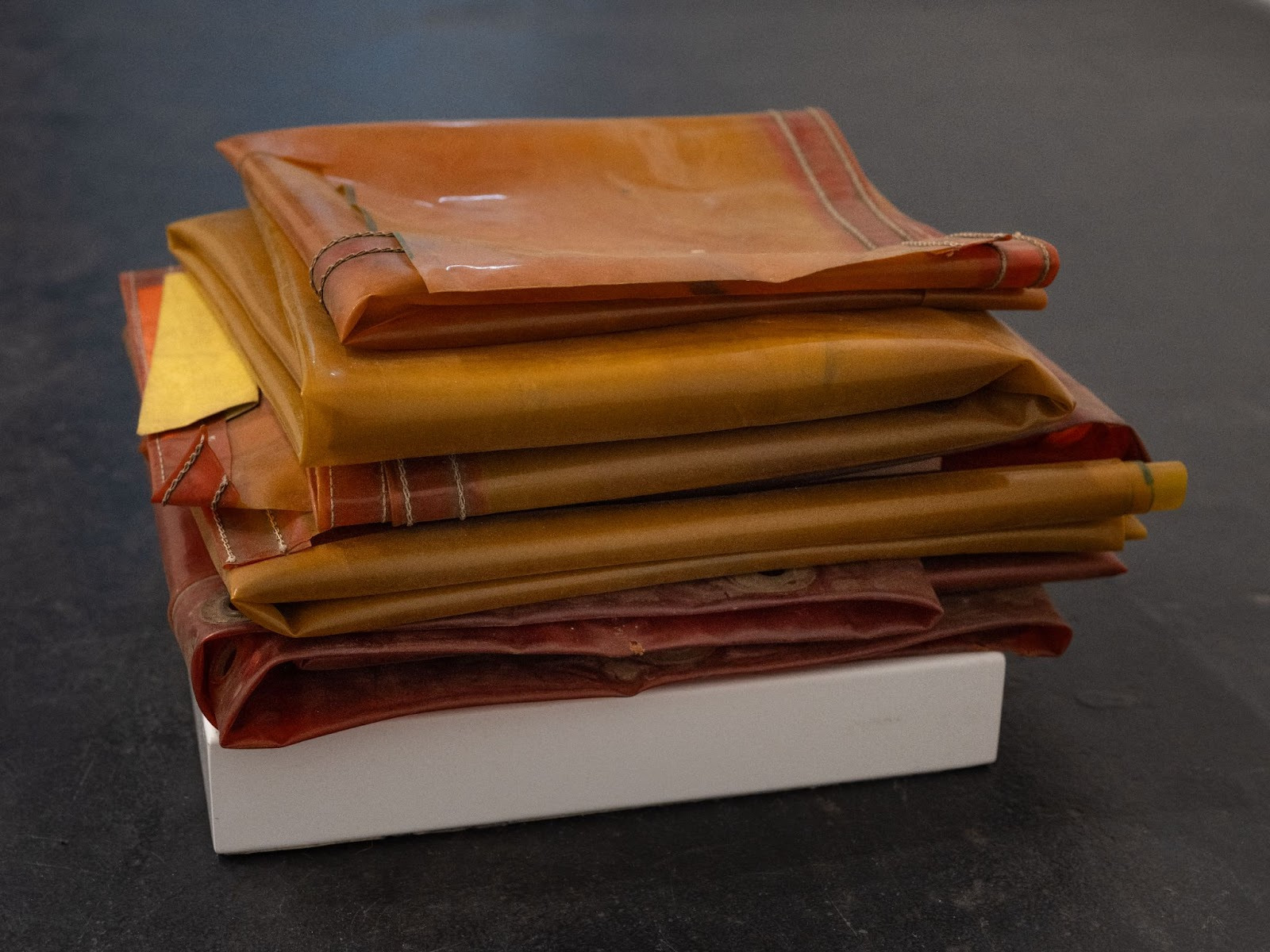 A stack of plastic bags

Description automatically generated